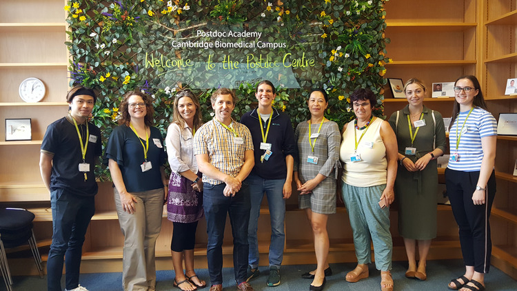 Photo of Postdoc Academy team in Newman Library