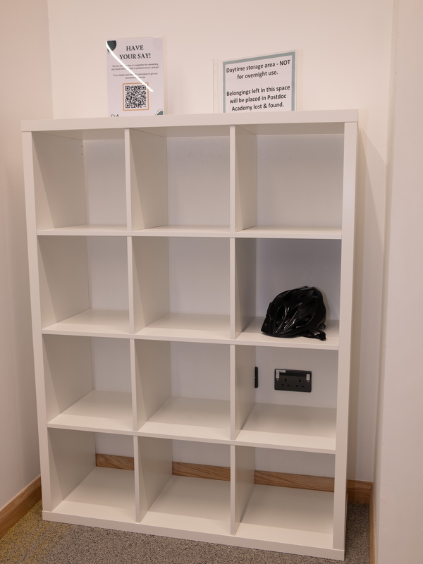 A set of shelves fills an alcove