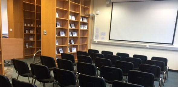 Photo of the Newman Library at the Biomedical Campus Postdoc Centre, with chairs set up for a lecture